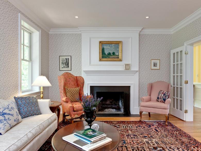 A newly insulated living room and upgraded fireplace.