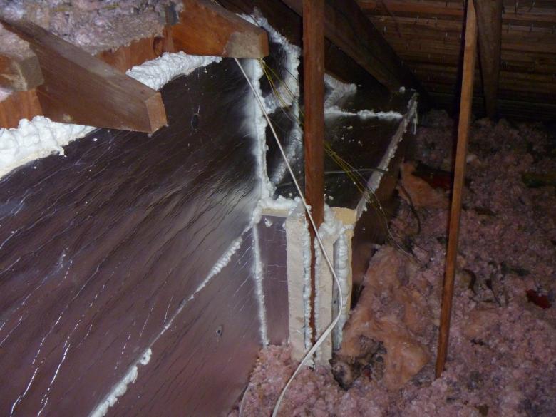 The walls in the attic space above the garage were air sealed.
