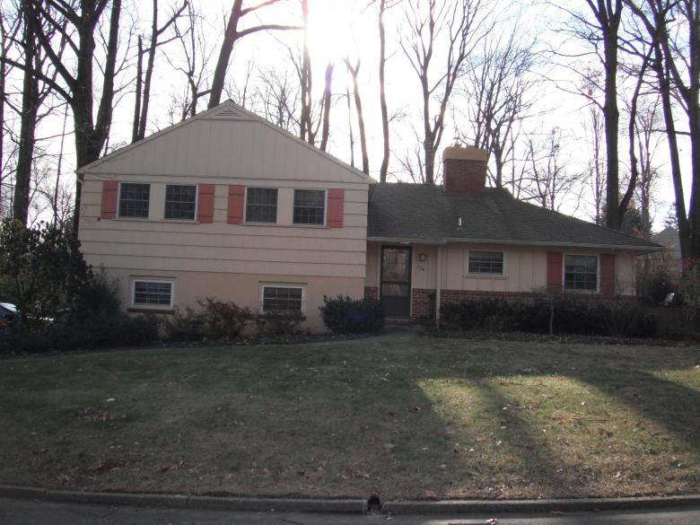 The home is located in a wooded area in Paoli, PA.