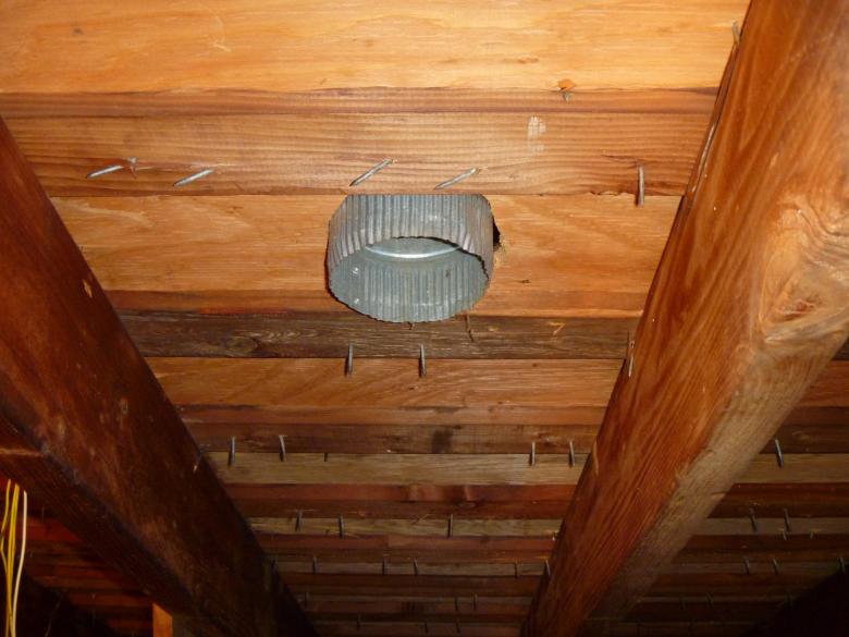 Before: the bathroom fan was not connected to the attic roof and thus vented directly into the attic.