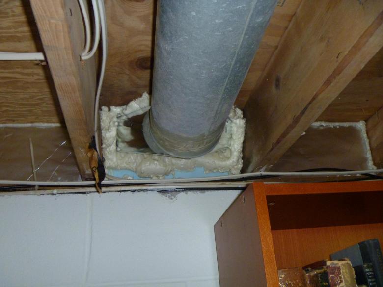 After: Orange Energy sealed the basement band joists and around duct work to stop airflow.